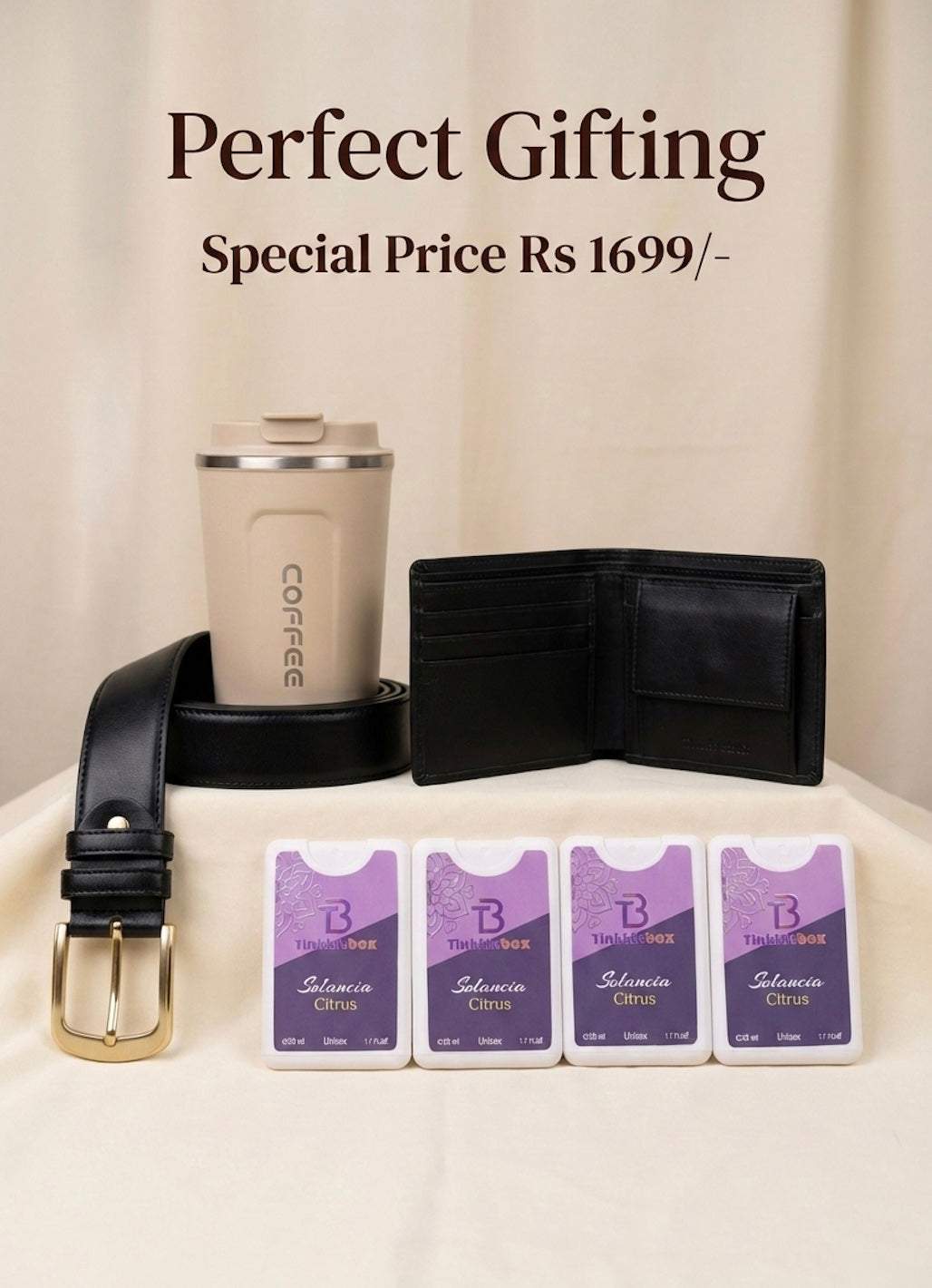 Gift set with tumbler, wallet, belt, and pocket perfume set on a white background